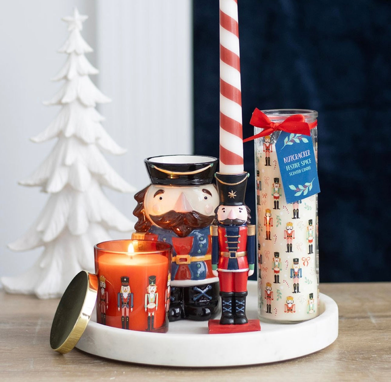 NUTCRACKER TAPER CANDLE HOLDER AND STRIPED CANDLE