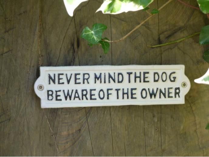 "Never Mind The Dog, Beware Of The Owner" Sign