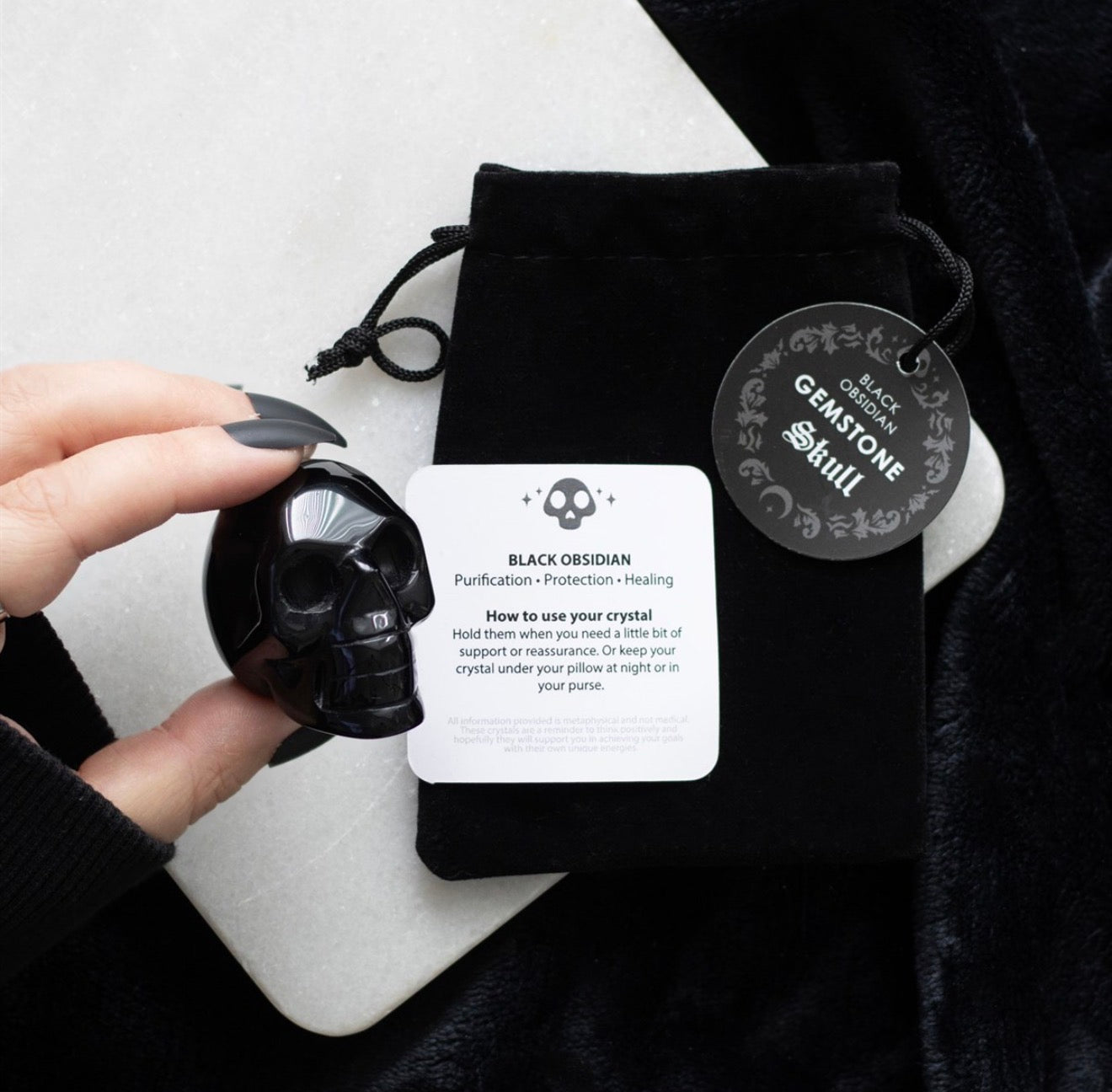 BLACK OBSIDIAN CRYSTAL SKULL